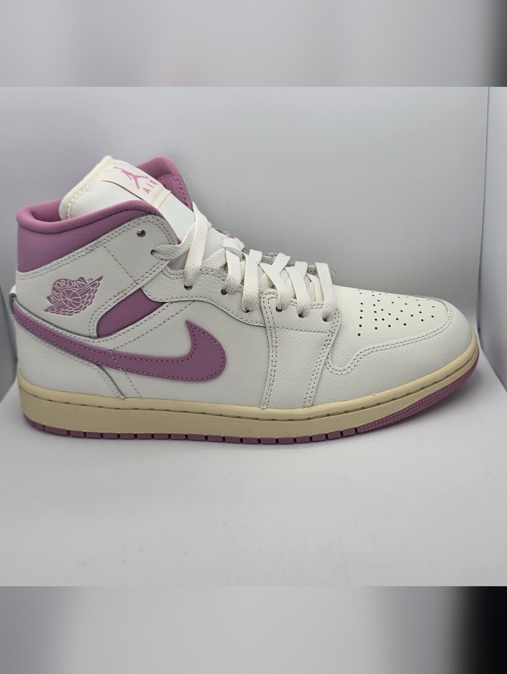 Nike Women’s Air Jordan 1 Mid Sneakers in Lavender/White